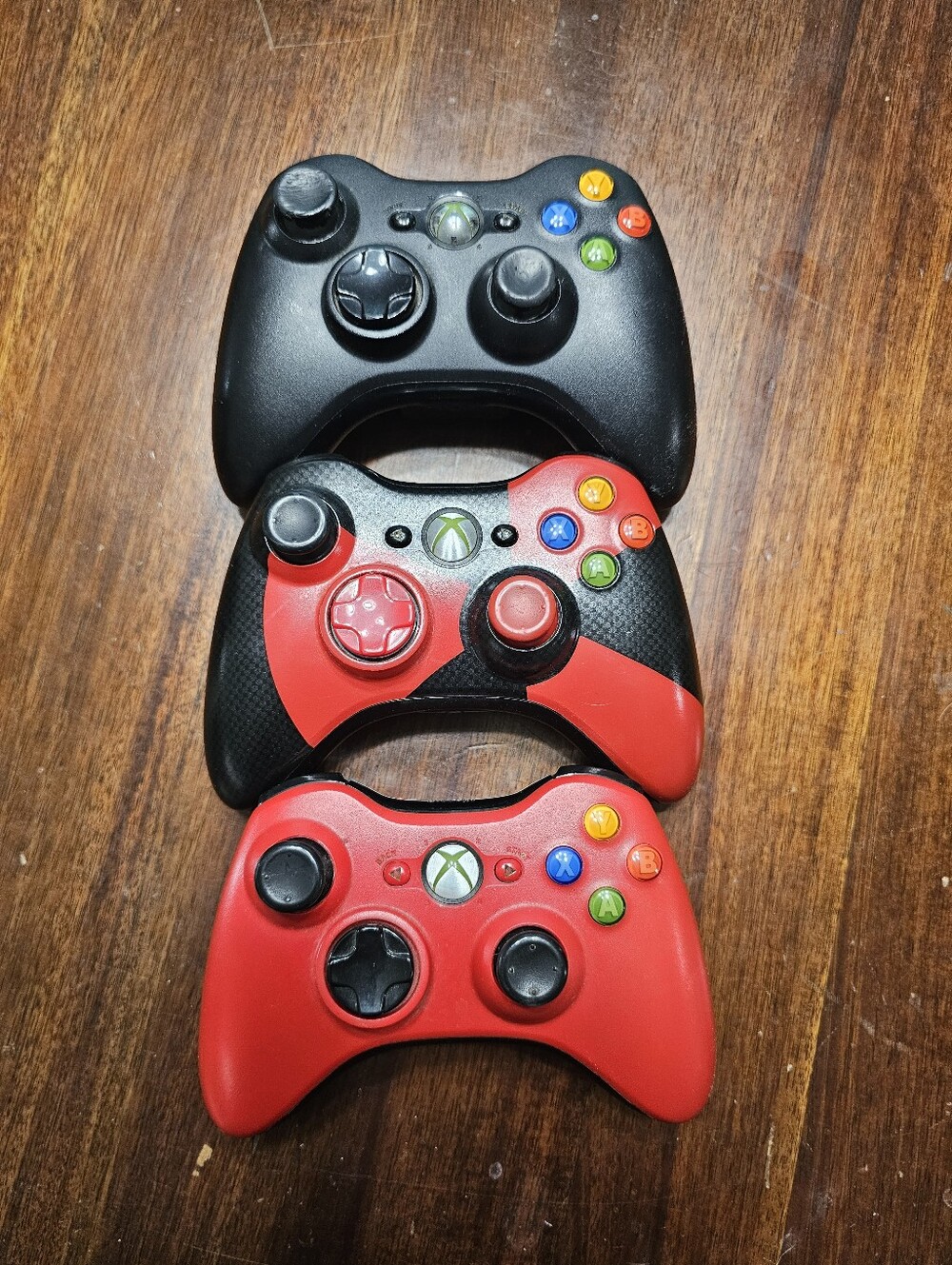 Lot Of Three Xbox 360 Wireless Controllers - Black and Red Variants
